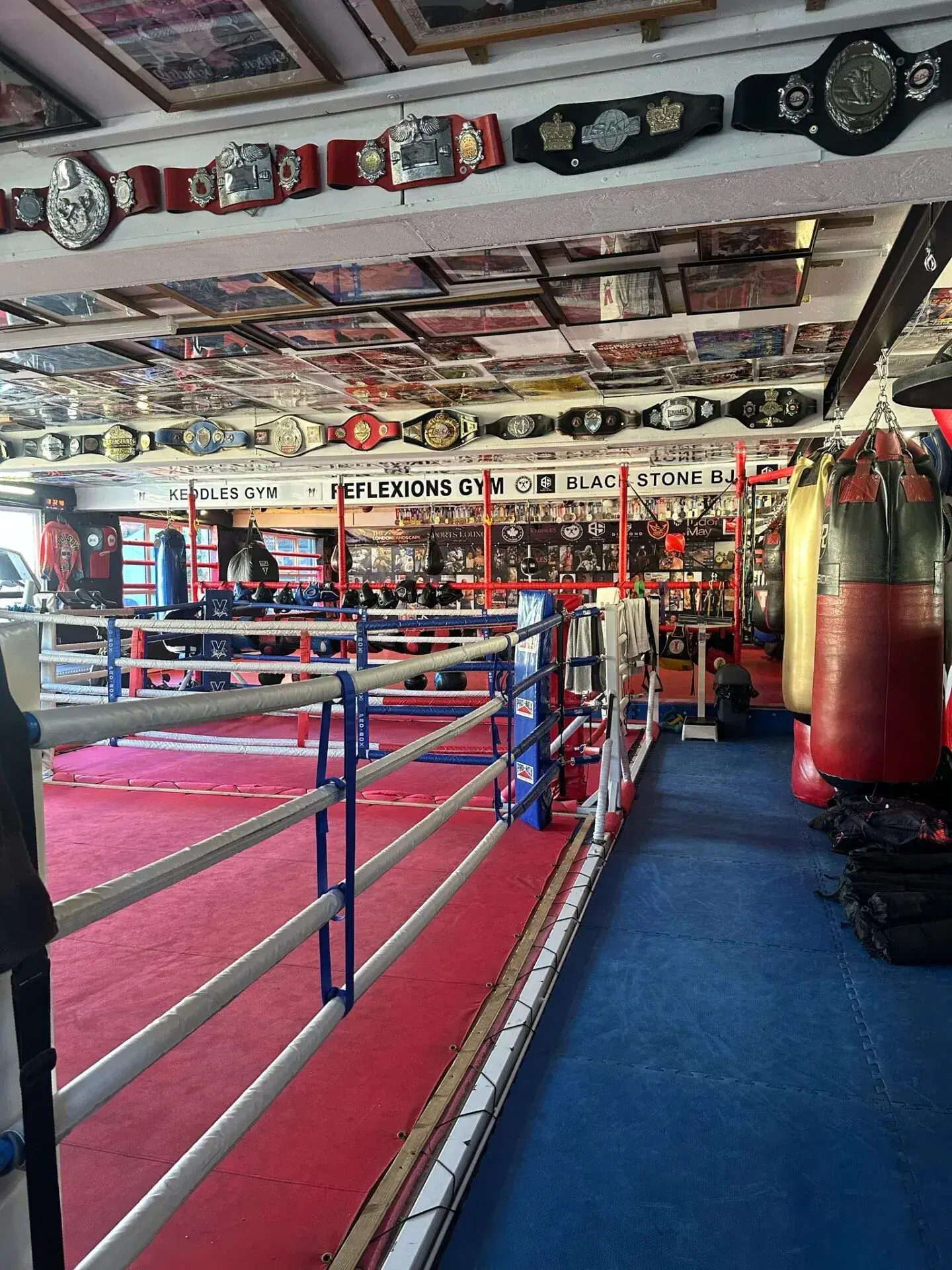 The boxing ring and training area at Reflexions Gym